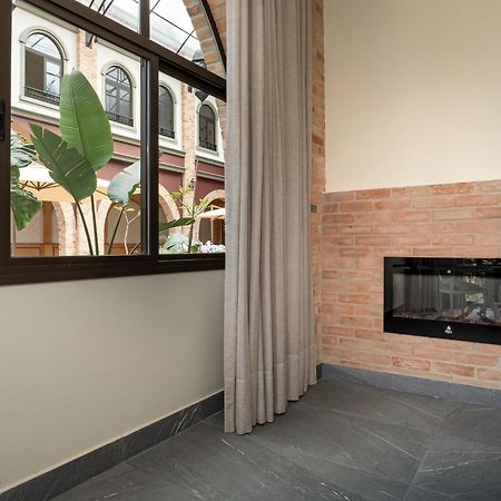 Pousada Luis XV Campos do Jordao Exterior photo A fireplace in a home