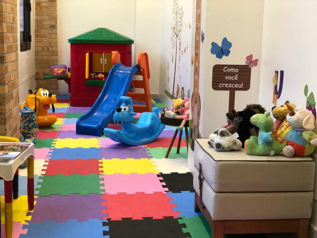 Pousada Luis XV Campos do Jordao Exterior photo A playroom at a daycare center in Brazil